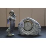 A boxed Lladro porcelain clock,