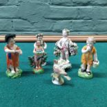 A group of six early 19th Century putti and children figures together with a bird