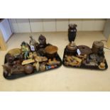 Various carved wooden items including figures,