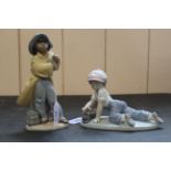 A boxed, signed and personalised by a member of the Lladro family,