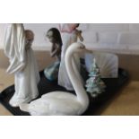 Six matte Lladro porcelain figurines including South American children, girl with puppy,