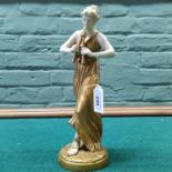 A Worcester figure of a woman with pipes marked 1826 to base,