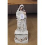 A Victorian Staffordshire figure group of Mary and Baby Jesus, includes a holy water stoup,