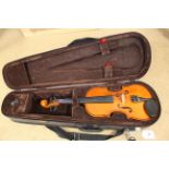 A Stentor Student standard 1/4 violin in case (slight damage to top of wood)