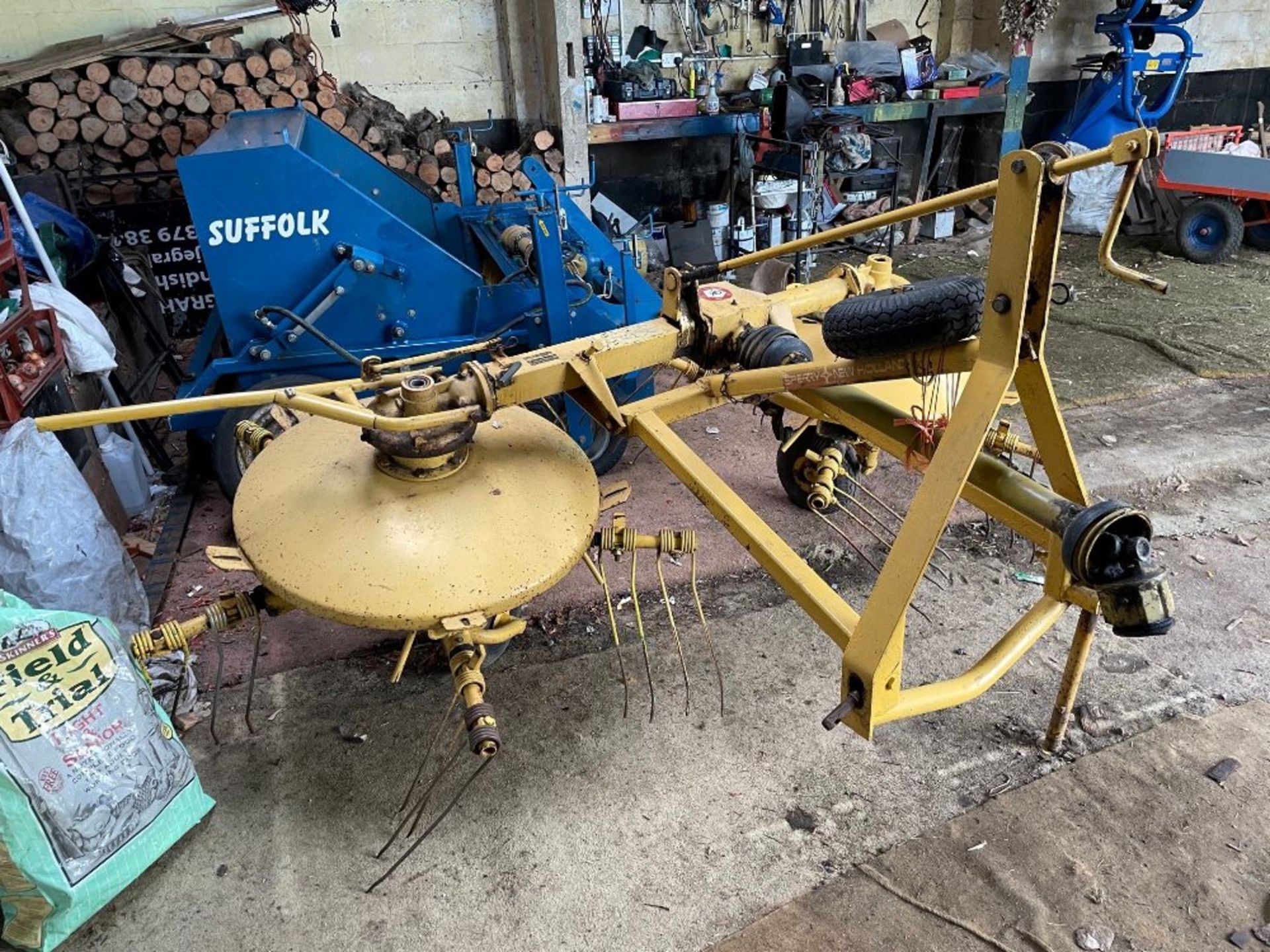 New Holland Sperry Hay Turner c/w instruction book and parts book. Stored near Woodbridge, Suffolk.