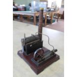 A large vintage German stationary steam engine and drive with faux brick detail