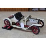 A Mamod steam car, appears complete,