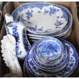 Vintage meat plates mainly Willow pattern together with a stack of blue and white plates and a