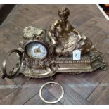 A late 19th/early 20th Century gilded spelter figural mantel clock marked British United Clock Co
