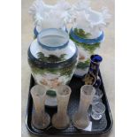 A trio of hand blown white glass vases,