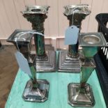 Two pairs of silver candlesticks (as found)