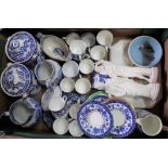 Various blue and white china including porcelain cups (some Doulton), two lidded canisters,