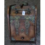 An ornate early 20th century oak coal bin with brass hinges and decoration,