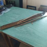 A carved wooden vintage model of an outrigger canoe, possibly Hawaiian (as found),