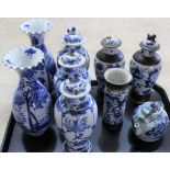 A pair of 19th Century Chinese blue and white vases (chips and hairline cracks to one) a trio of