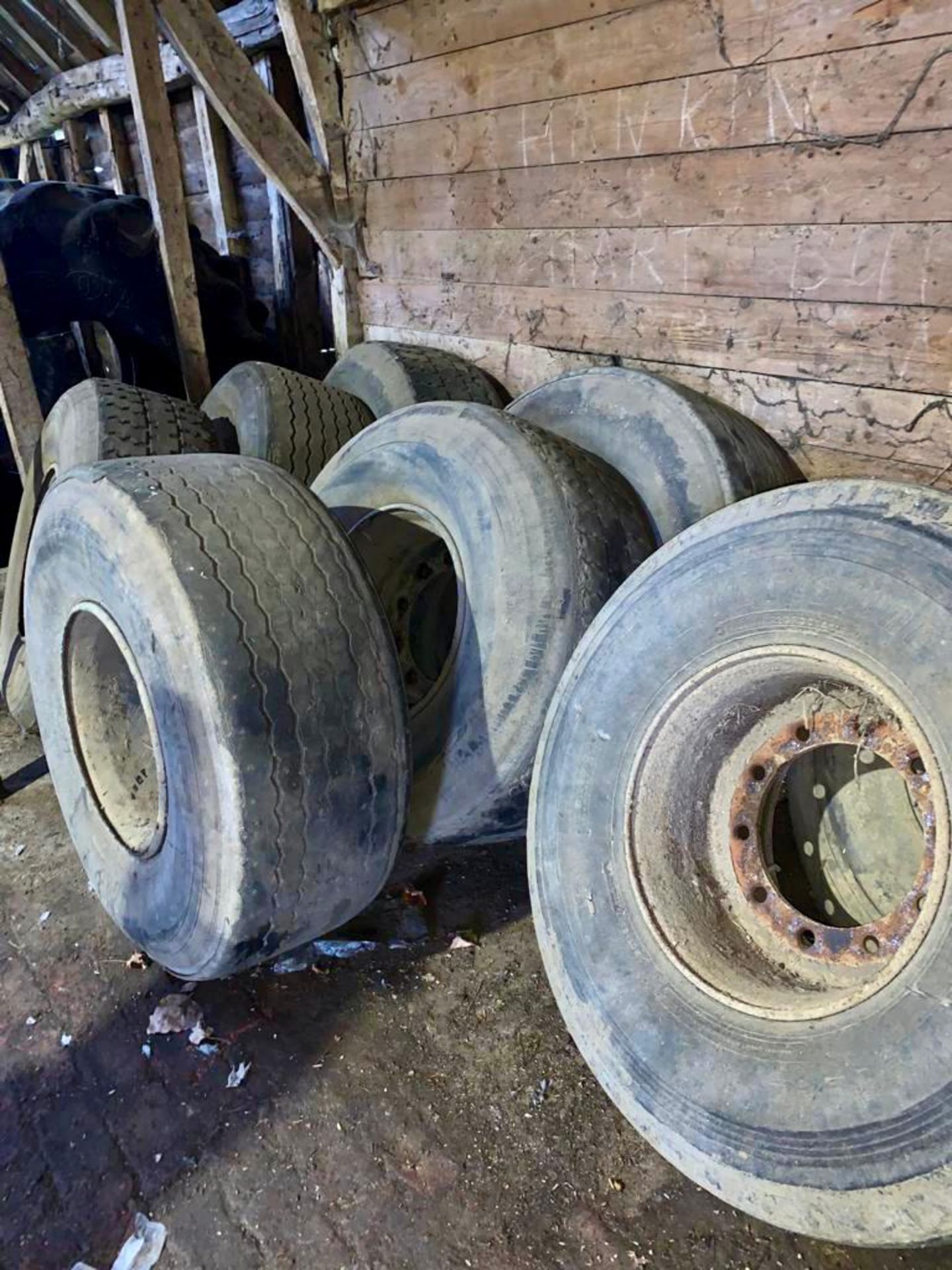 8 x 18R19.5 Tyres and Wheels - were previously on trailers. Stored near Chatteris, Cambridgeshire.