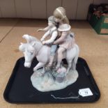 A large Lladro figurine group 'The Pony Ride',