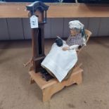 A large carved wood automaton figure of an old lady in rocking chair made by Eric Williamson,