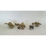 Four model brass cannons