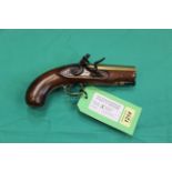 A brass barrelled Flintlock overcoat pistol, lock marked T Rea,