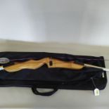 A 'Core Archery' flash laminate bow with arrows and Archery World carry case