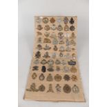 A fine display of sixty various cap badges