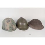 Three various helmets