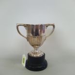 A silver twin handled trophy cup inscribed 'The Officers and Sergeants Annual Shooting Challenge