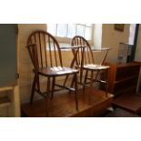 Two of utility elbow chairs with stamp (as found)