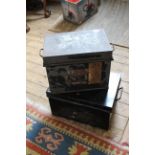 Two vintage black painted metal safety deposit boxes