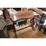 A mid Victorian mahogany stretcher table