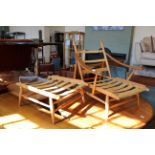 A blonde Ercol 442 lounge arm chair and matching foot stool (as found,