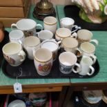 A collection of Royal commemorative mugs and beakers including a loving cup for the Coronation of