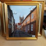 Three framed oil paintings on board signed Keith Hastings of a street scene with church,