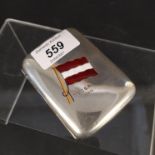 A silver cigarette case with enamelled flag decoration inscribed "VEGA 1906",