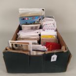 A large selection of British and world stamps, some in unsorted small folders, stamped envelopes,