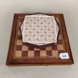 A wooden boxed chess set plus an octagonal box chess set