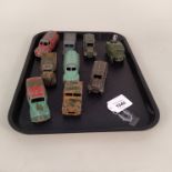 A group of mainly pre war Dinky's including Austin and military vehicles (all very playworn)