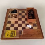 Two wooden chess boards plus a boxed set of 'French chess' pieces and one other