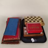Four wooden boxed travelling chess sets, pocket chess,