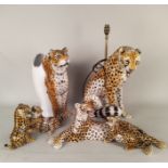 Italian porcelain figures of a seated cheetah lamp base and a cheetah umbrella stand (tiny chip to