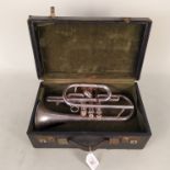 A cased silver plated vintage cornet, the bell marked Besson England New Standard,