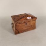 An early Victorian rosewood sarcophagus shaped tea caddy with brass ring handles
