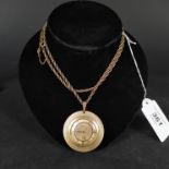 A gold plated Bulova Accutron pendant watch on gold plated chain