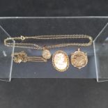 A mixed lot including a 9ct gold framed cameo,