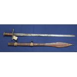 An ethnic sword with leather tooled scabbard