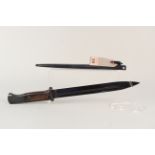 A Third Reich era 84/98 knife bayonet dated 1944 with a 1943 dated scabbard,