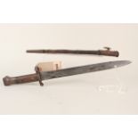 A British 1888 model bayonet (Mk I 2nd type) by Mole with scabbard (in overall worn condition)