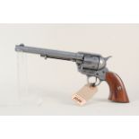 A quality inert replica of a 'Colt 45' complete with wooden grips,