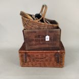 A wicker picnic basket,